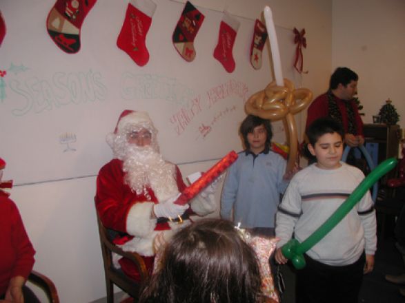 Students and faculty enjoy Holiday Party 2005.