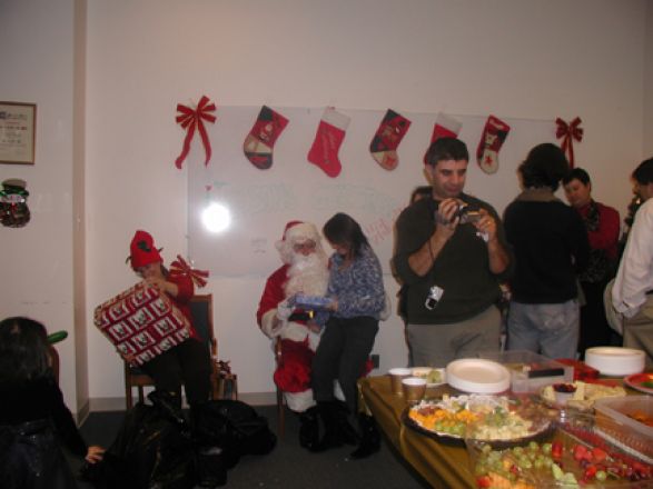 Students and faculty enjoy Holiday Party 2005. Students and faculty enjoy Holiday Party 2005.