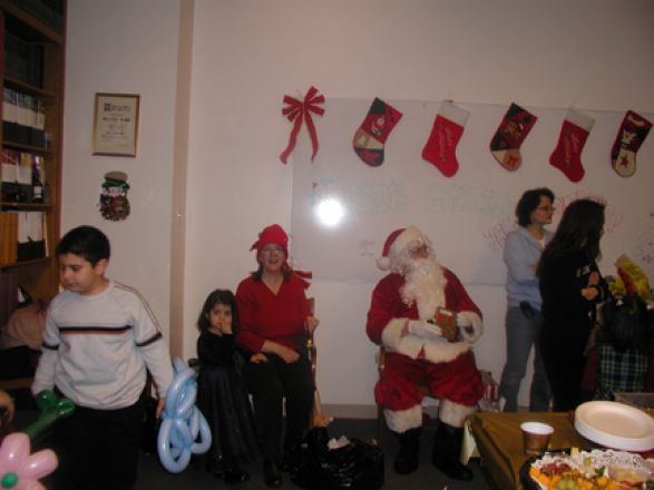 Students and faculty enjoy Holiday Party 2005. Students and faculty enjoy Holiday Party 2005.
