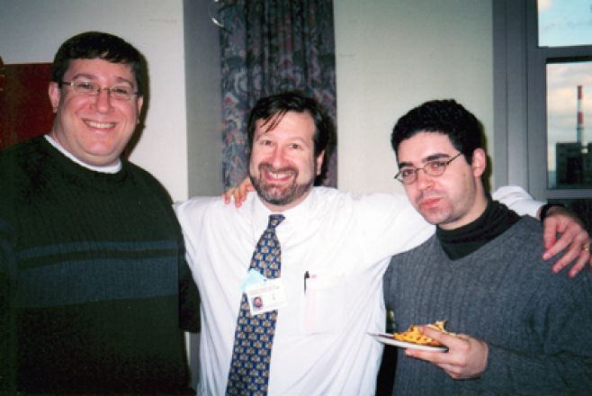 Students and faculty enjoy Holiday Party 2003.