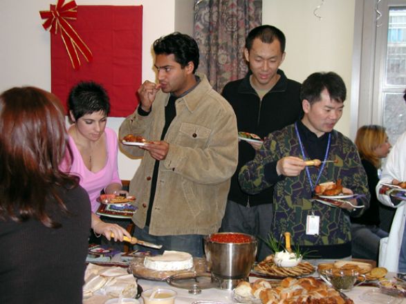 Students and faculty enjoy Holiday Party 2003.