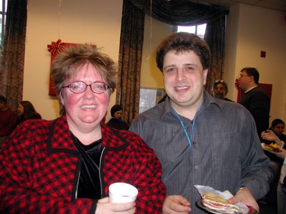 Students and faculty enjoy Holiday Party 2003.