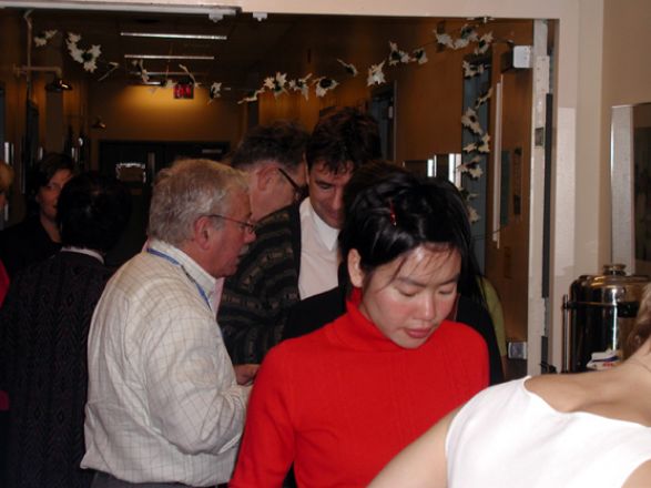 Students and faculty enjoy Holiday Party 2003.