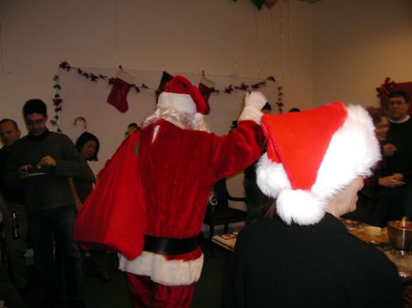 Students and faculty enjoy Holiday Party 2003.