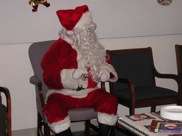 Students and faculty enjoy Holiday Party 2003.