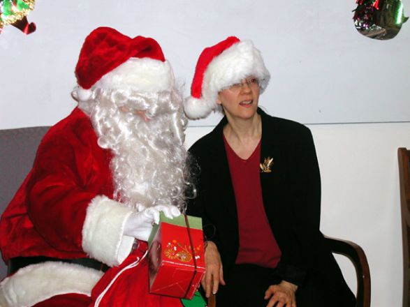 Students and faculty enjoy Holiday Party 2003.