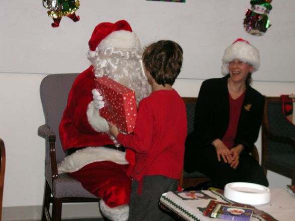 Students and faculty enjoy Holiday Party 2003.