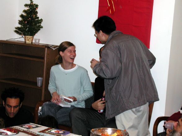 Students and faculty enjoy Holiday Party 2003.