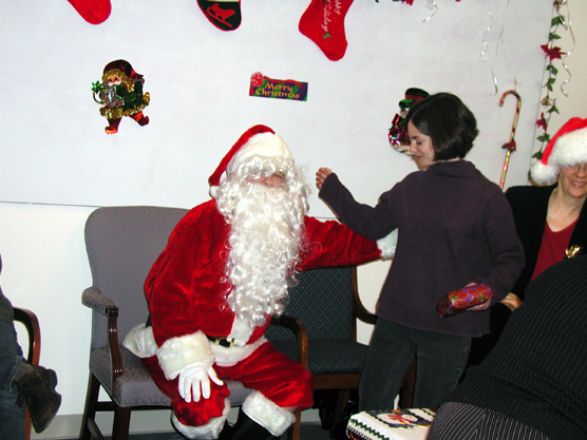 Students and faculty enjoy Holiday Party 2003.