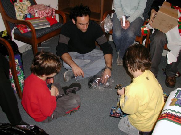 Students and faculty enjoy Holiday Party 2003.