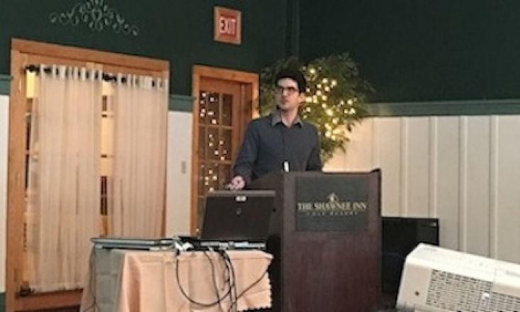 Speaker at a podium. Speaker at a podium.