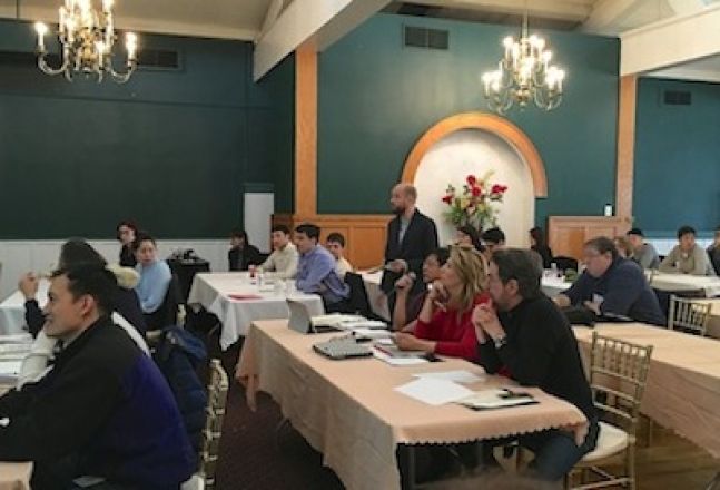 Students sitting together at a table.