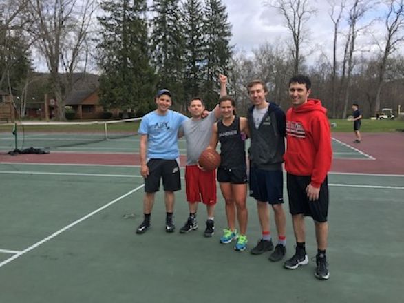 Group of students standing outdoors.