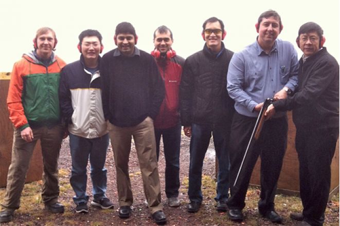 Group of students standing outdoors.