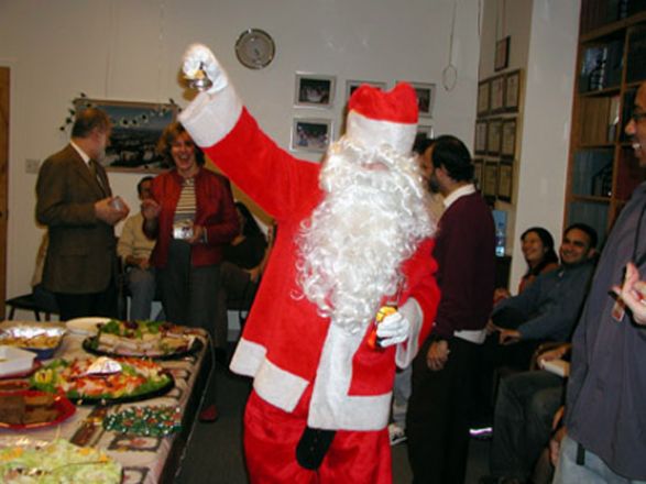 Students and faculty enjoy Holiday Party 2002.