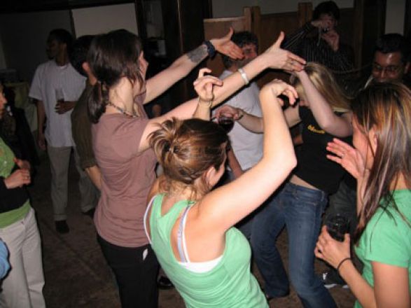 Students dancing at a party.