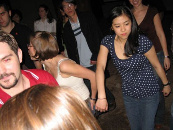 Students dancing at a party.