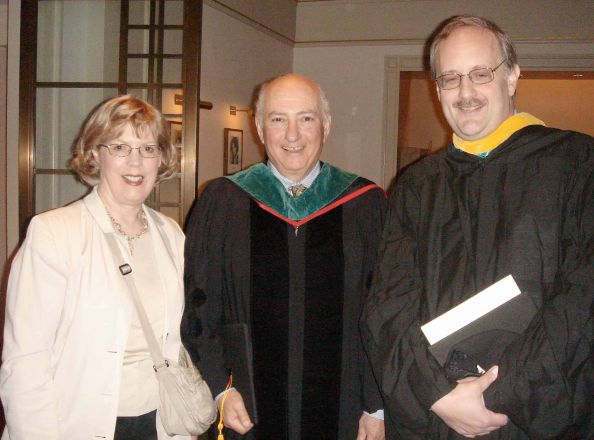 Alumni and professors in regalia.