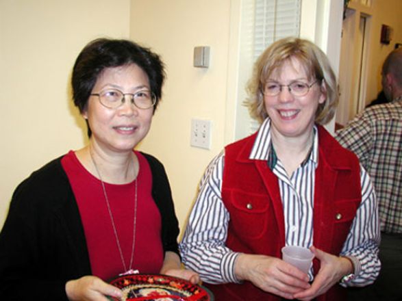 Students and faculty enjoy Holiday Party 2002.