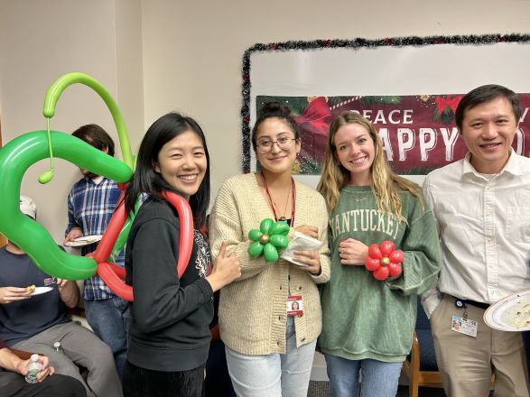 Dr. Yue Yang and her lab team along with Dr. Minkui Luo