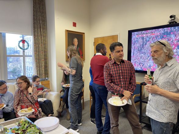 Dr. Jaffrey and Dr. Gross and others enjoying the holiday party.