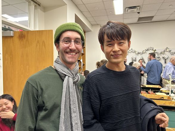 Leon Wagner and another guest enjoying the holiday party. Leon Wagner and another guest enjoying the holiday party.