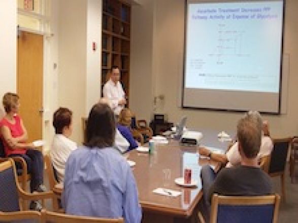 Dr. Changyuan Lu speaks at the faculty lunch seminar in the Pharmacology Dept on September 29, 2015.