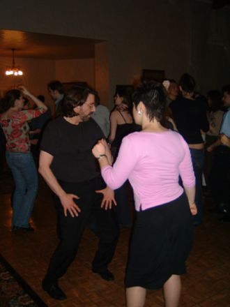 Students dancing at a party.