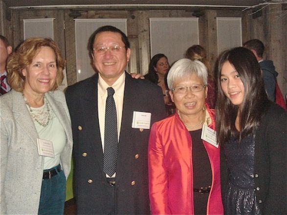 Dr. Lorraine Gudas with Dr. Hazel Szeto and Dr. Szeto&#039;s husband and daughter at the dinner.