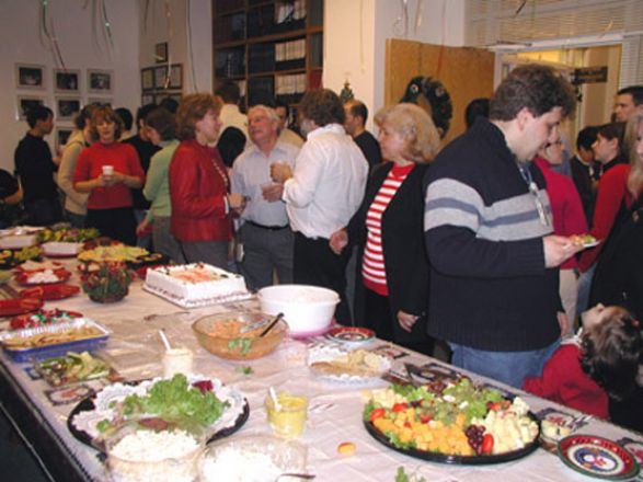 Students and faculty enjoy Holiday Party 2002.