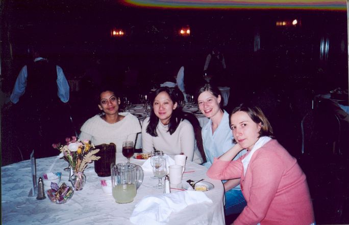 Students sitting in a cafeteria.