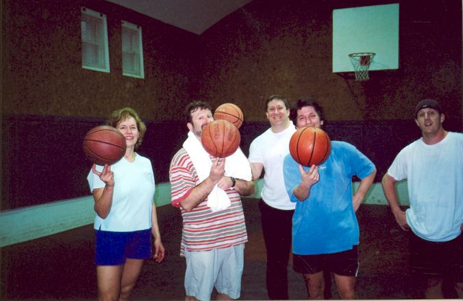 Students playing basketball.