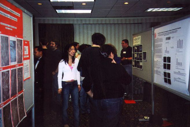 Students standing together in a hallway.