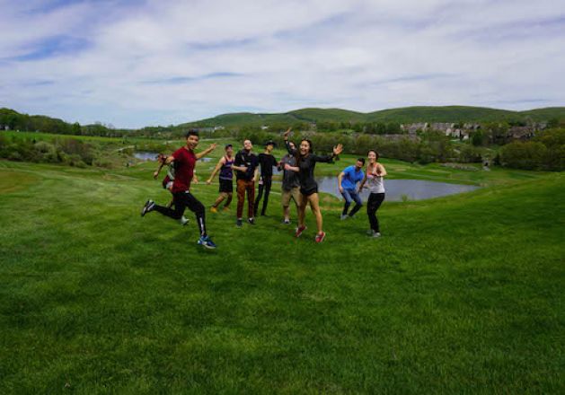 Group frolicking outside.