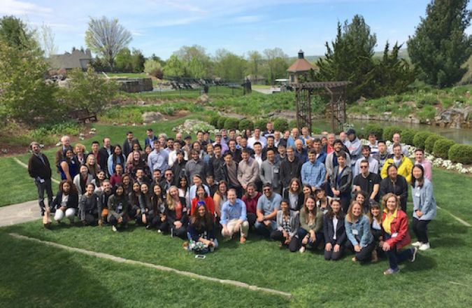 Large pharmacology group photo near gazebo.