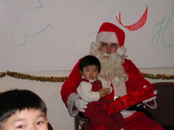 Students and faculty enjoy Holiday Party 2001.