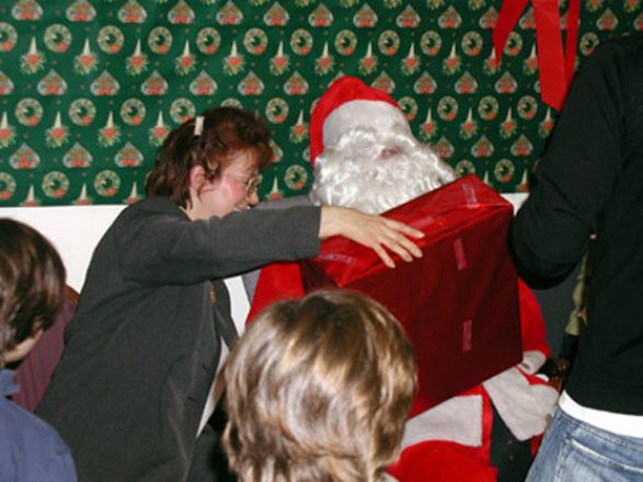 Students and faculty enjoy Holiday Party 2002.