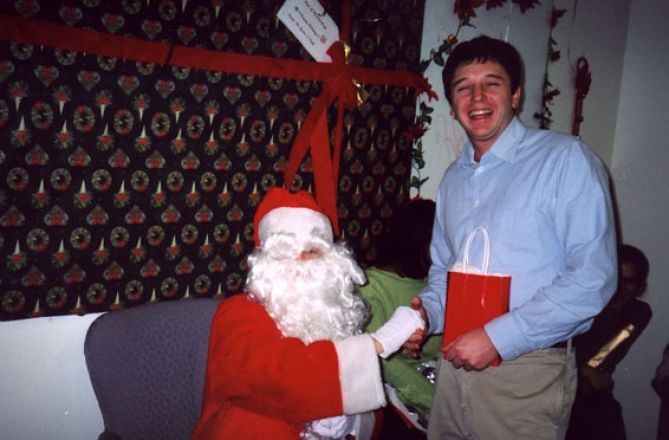 Students and faculty enjoy Holiday Party 2002.