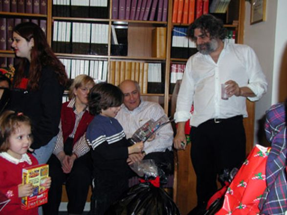 Students and faculty enjoy Holiday Party 2002.