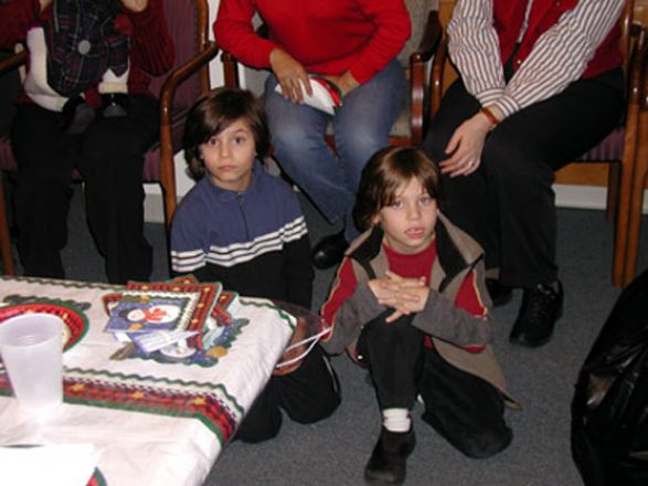 Students and faculty enjoy Holiday Party 2002.