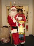 Santa (Chris Kelly) and Kristen