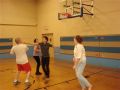 Group playing basketball.