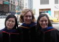 Dr. Gudas standing with graduates on 7th Avenue.
