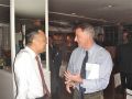 Dr. Gerald Chan talks with Dr. Nico Schiff of Weill Cornell at the dinner the night before the symposium.