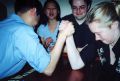 Students arm wrestling.